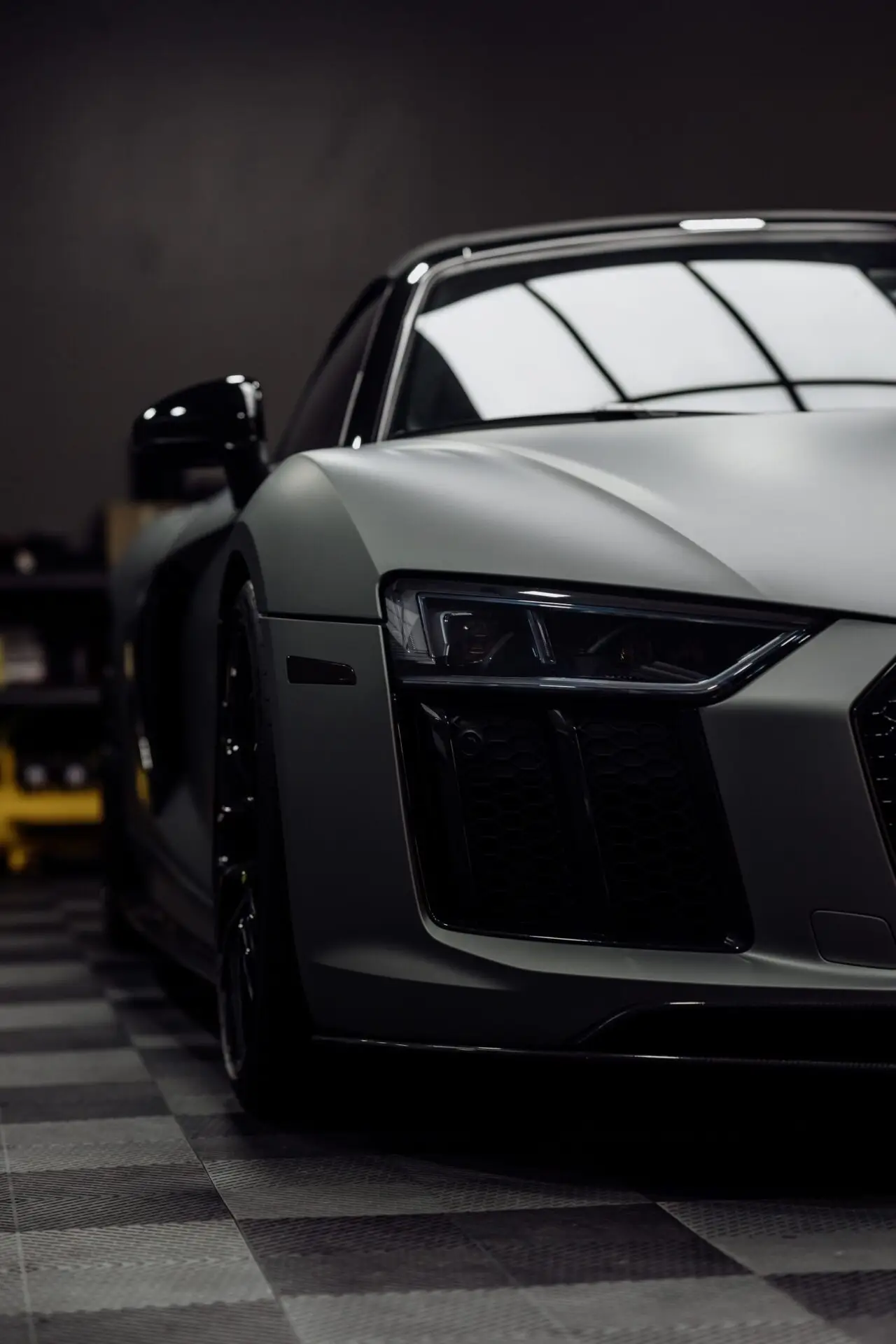 Audi R8 headlight and front corner in matte anthracite colour-change vinyl