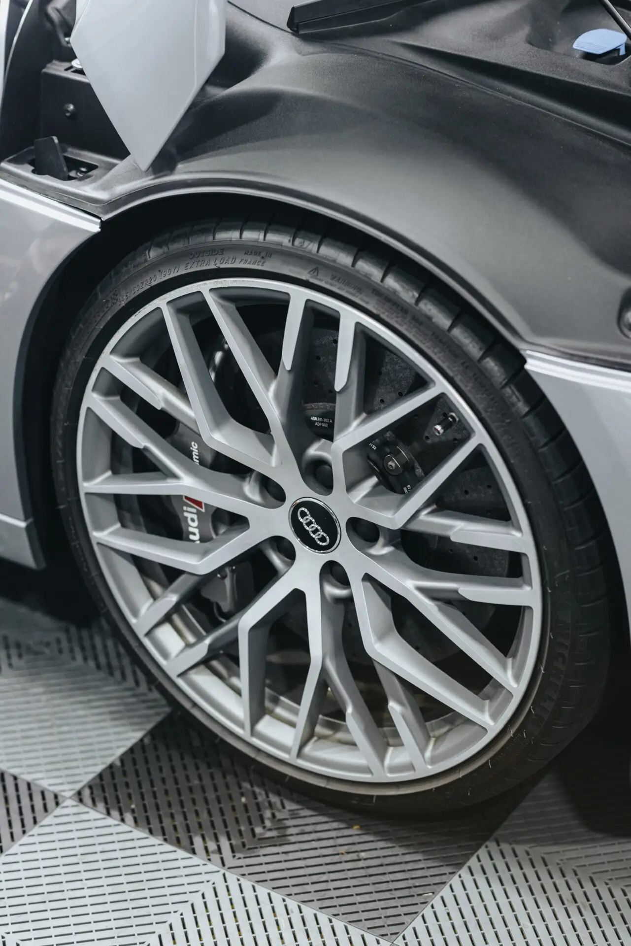 Close view of an Audi R8 front wheel and wheel arch