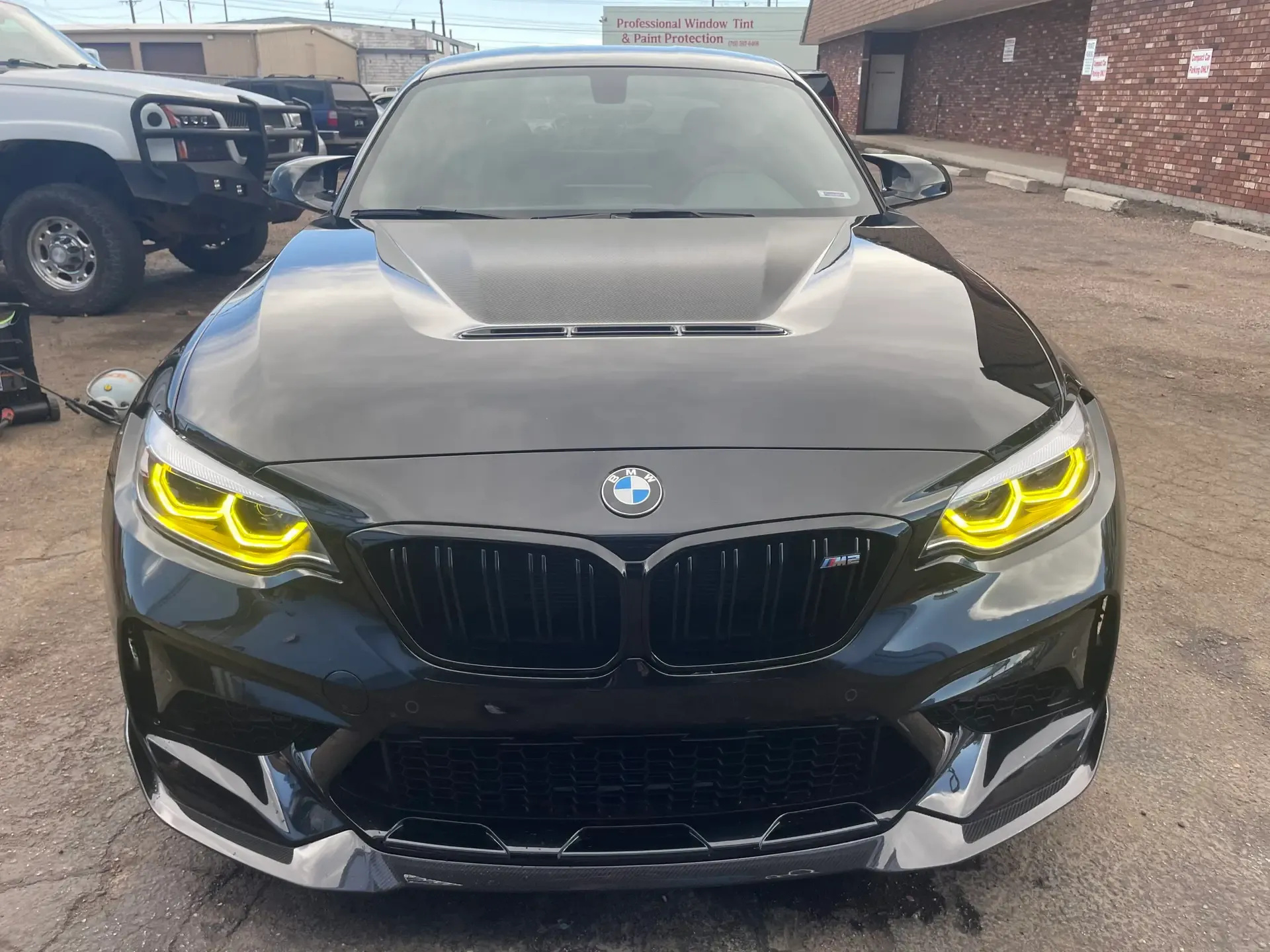 Black BMW coupe after an exterior detail by ST6 Detailers