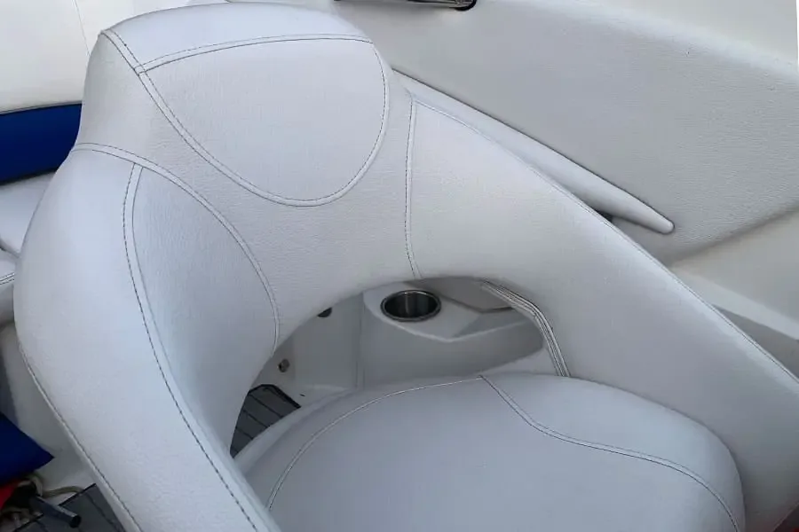 The same helm seat after cleaning, the vinyl even and bright