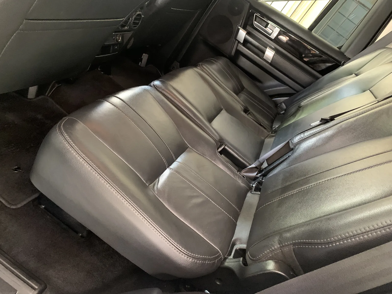 Clean leather seats and carpet in a customer vehicle after an ST6 interior detail