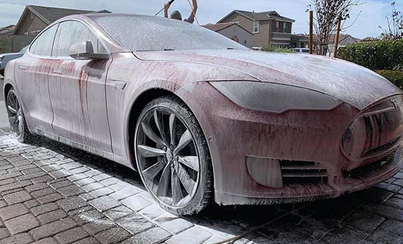 Foam bath hand wash on a Tesla