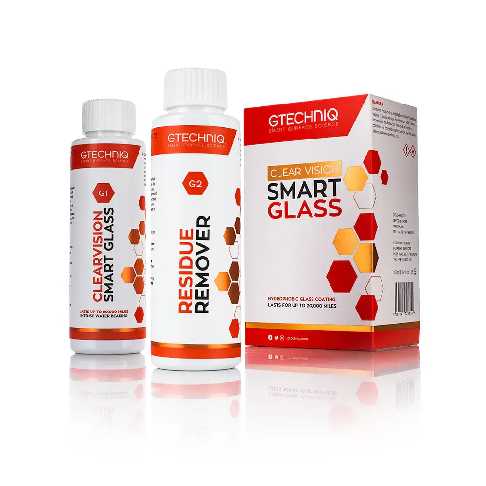 Three Gtechniq product boxes — ClearVision Smart Glass, Residue Remover and Smart Glass — in white packaging with red hexagon graphics