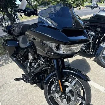 Black Harley-Davidson CVO Road Glide bagger with fairing and saddlebags after detailing