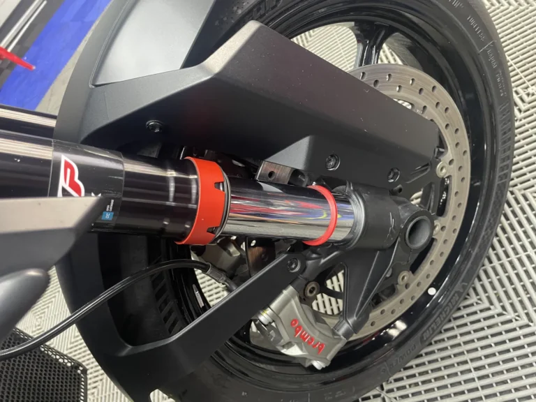 Cleaned front wheel, fork and brake caliper on a KTM Super Duke