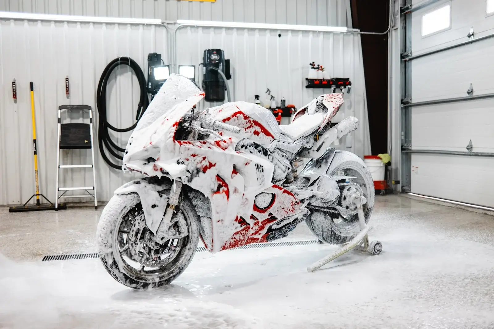 Ducati motorcycle covered in foam during a hand wash