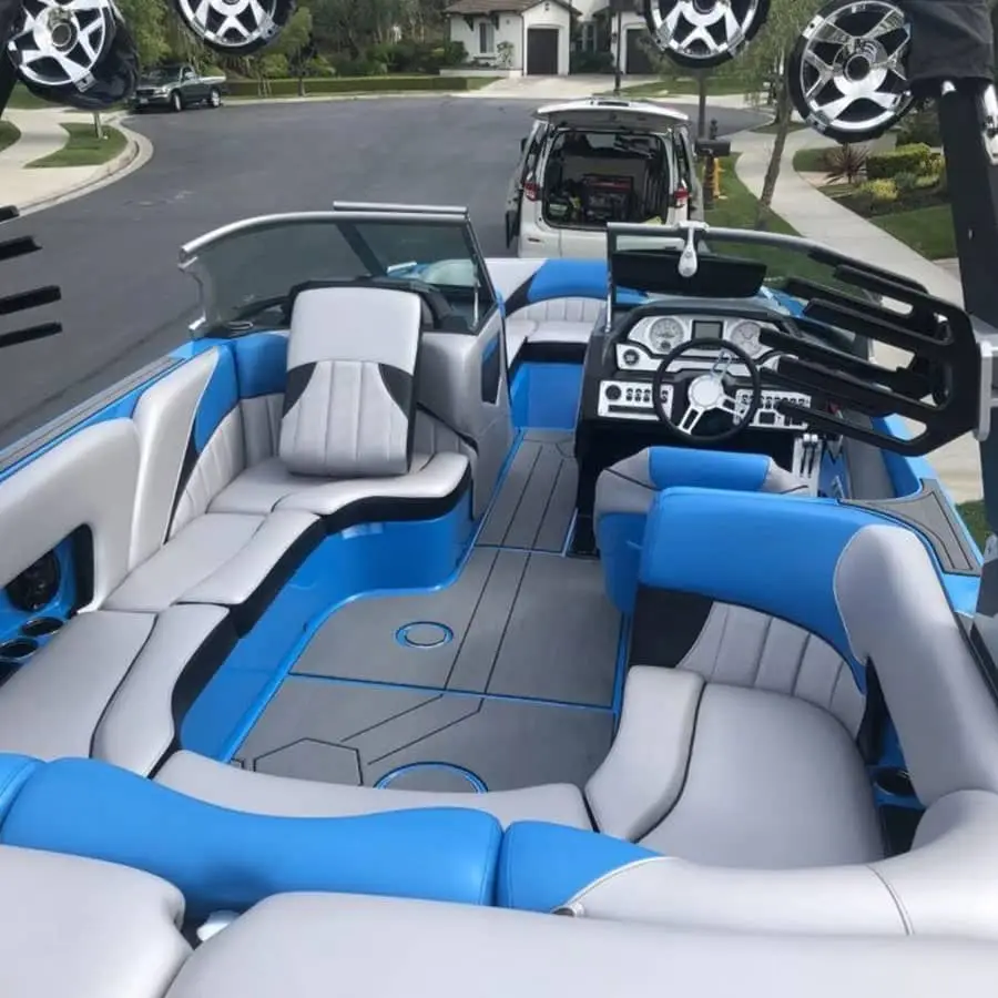 Finished wake boat cabin with blue and white upholstery detailed by ST6 Detailers in Colorado Springs