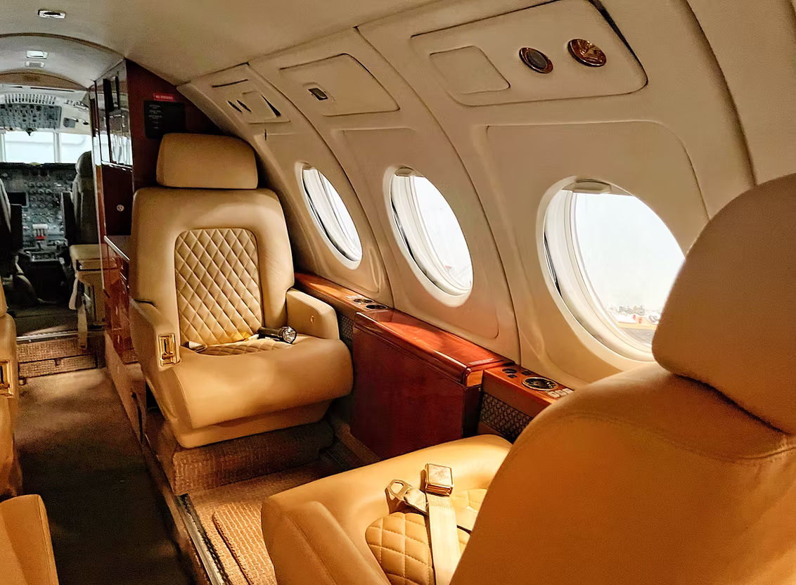 Aircraft cabin with leather seating and wood trim