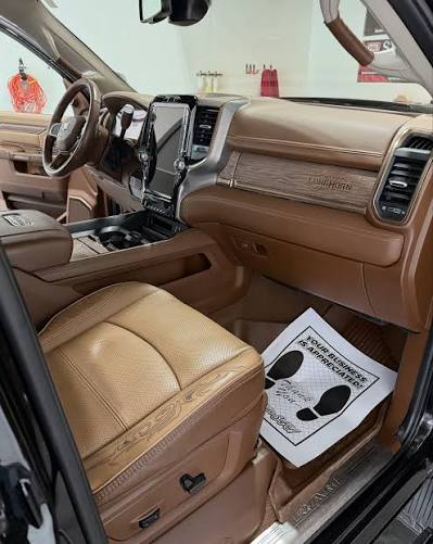 Ram Longhorn tan leather passenger seat, dashboard and center console