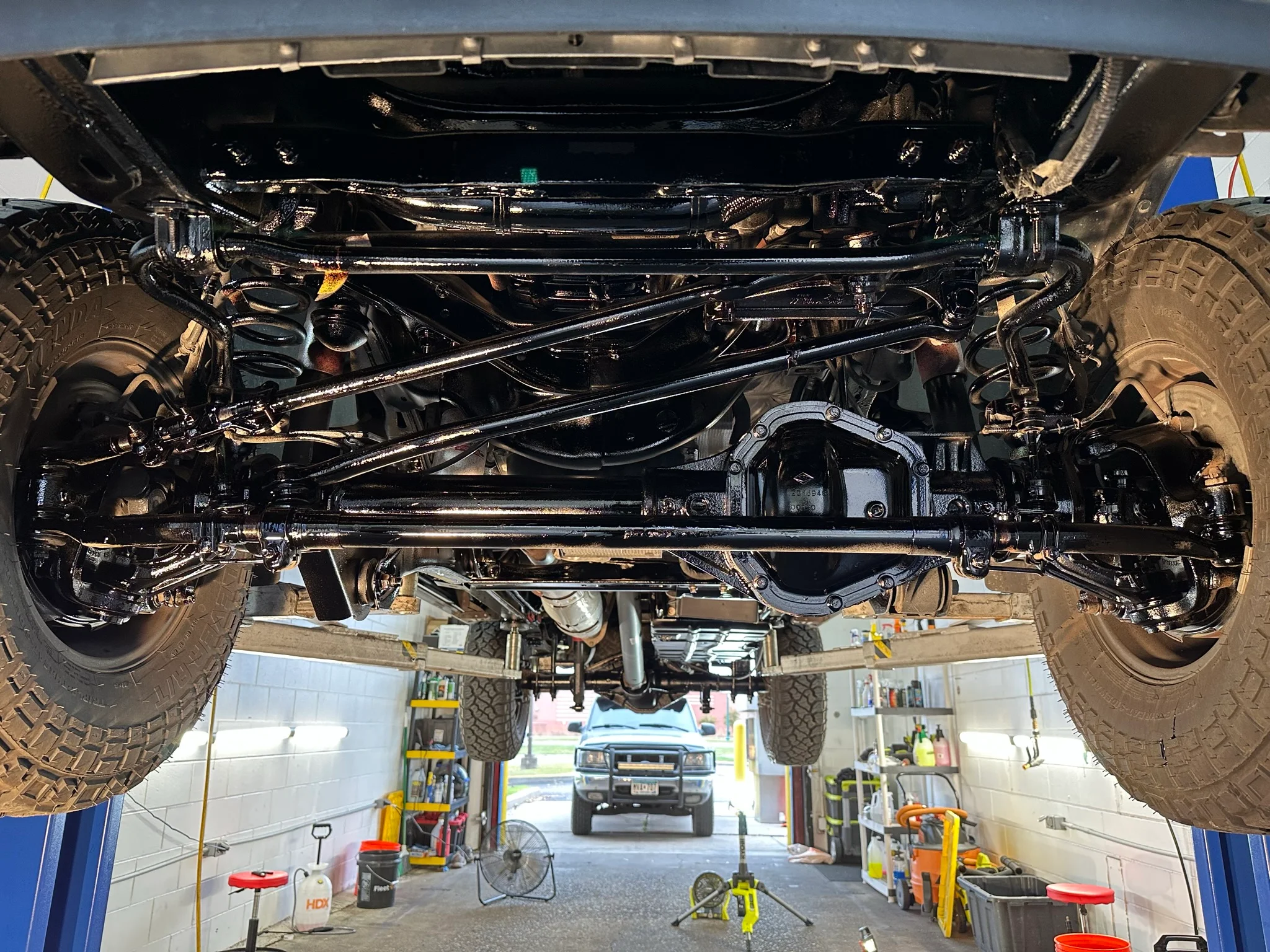 Owner-provided coated rear axle and underbody example